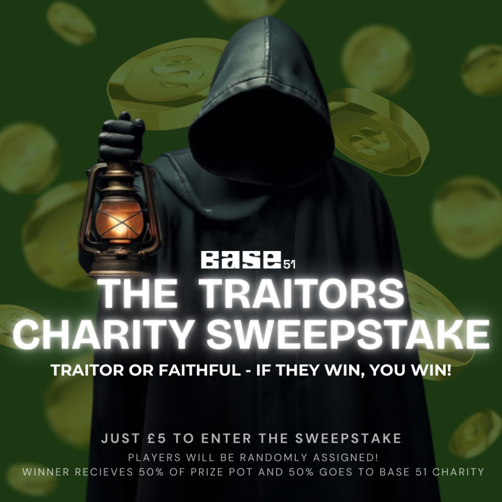 Person in a green cloak holding a lantern.